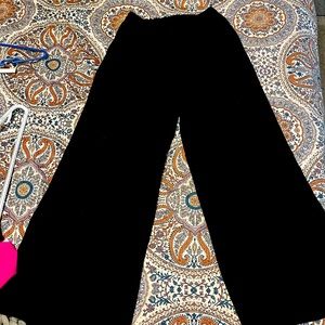 Two pairs of brand new high-rise, cropped , wide leg dress pants.